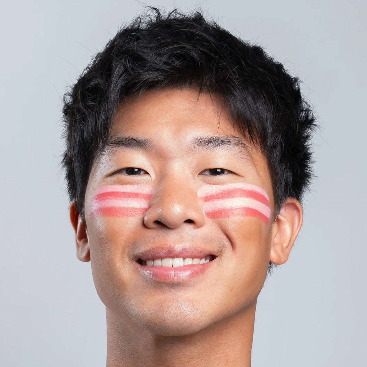 Rose zinc stripes on cheeks