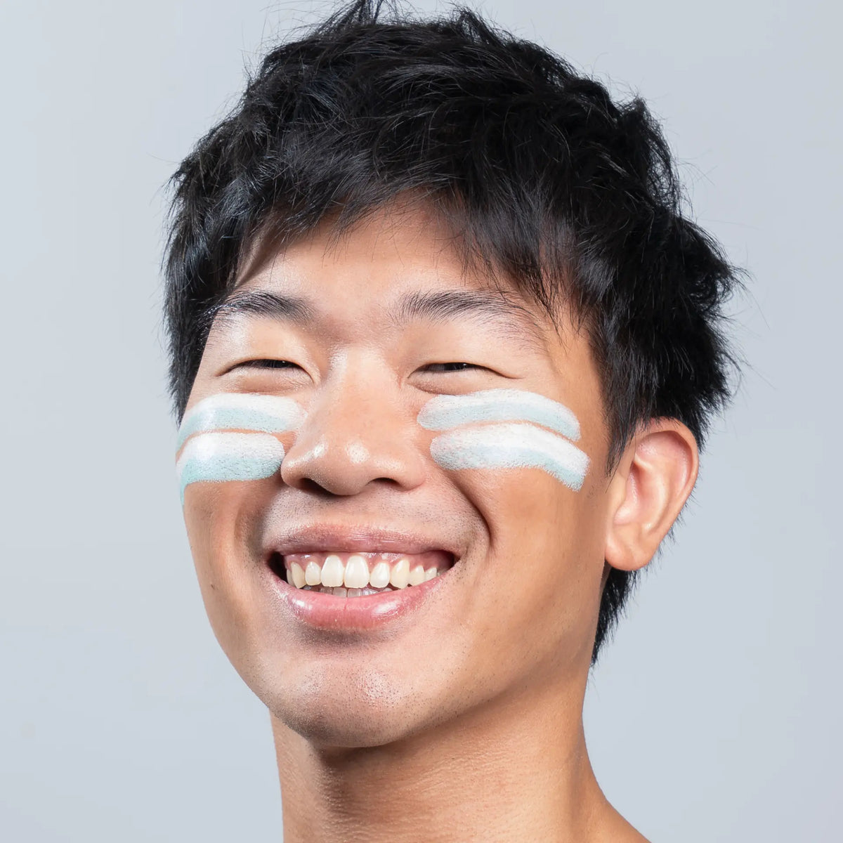 Model wearing Sunbeam zinc stick in Sky