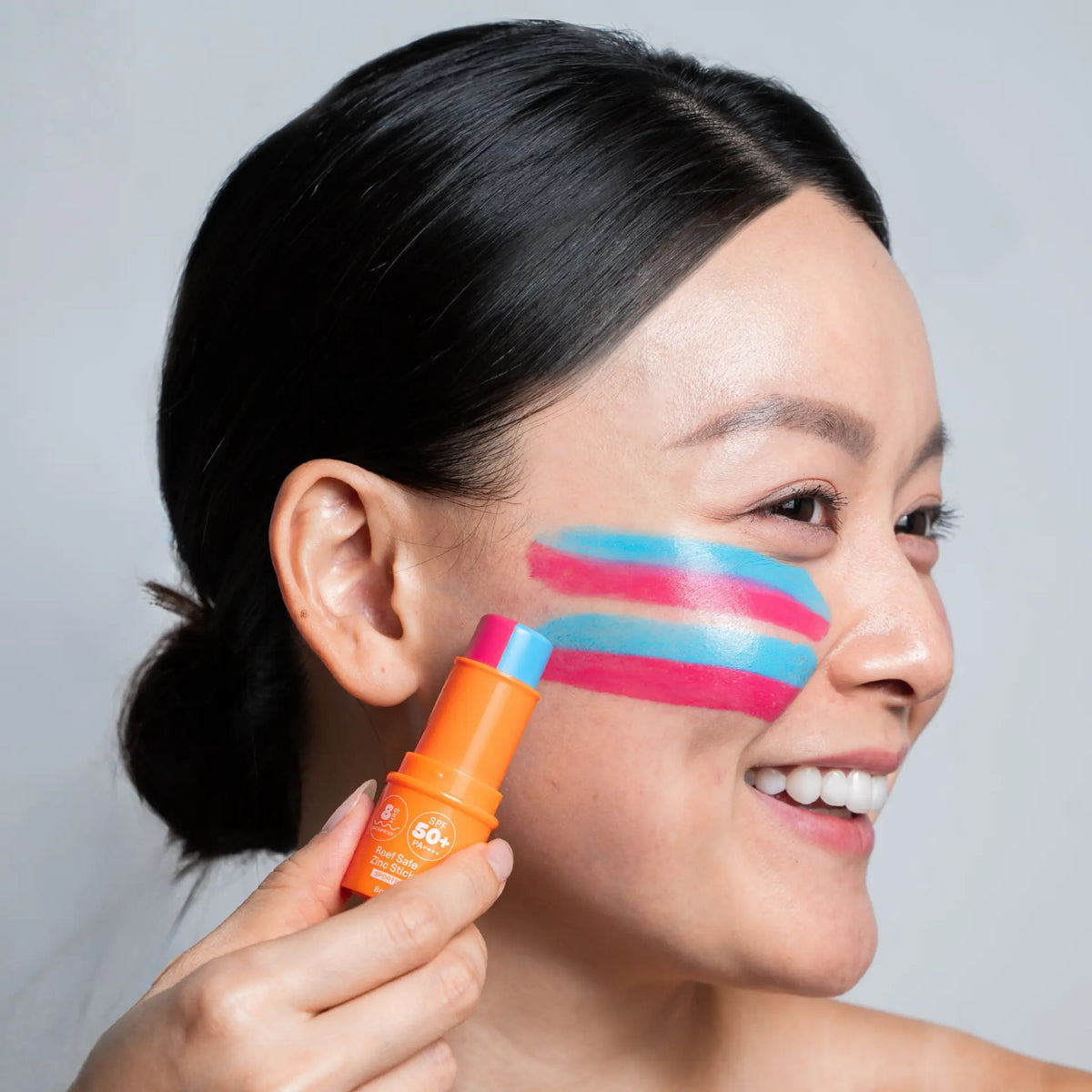 Model wearing Sunbeam zinc stick in Cotton Candy